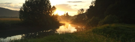 misty river sunset