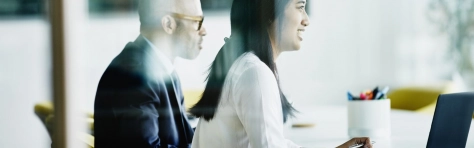 Man and woman working in Banking and capital markets