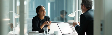 Woman and man in business meeting